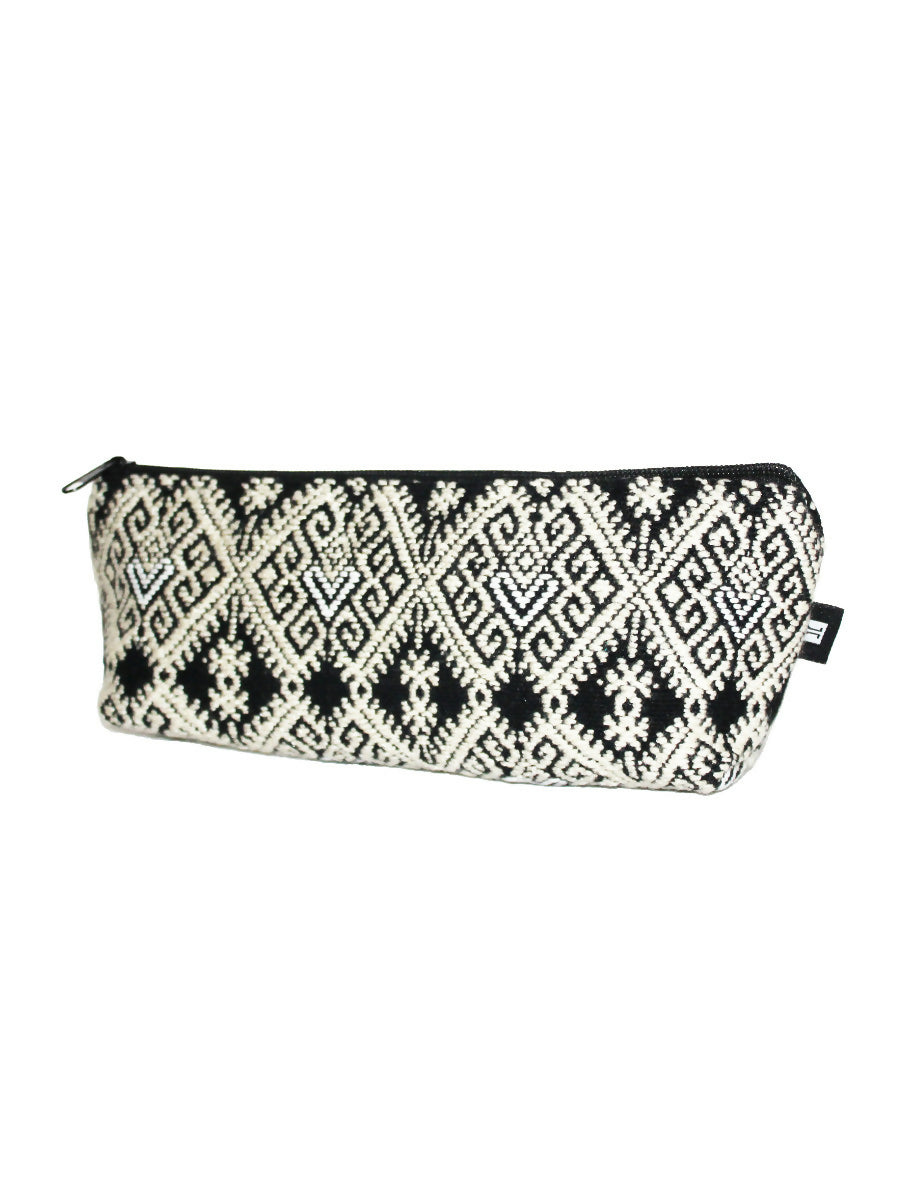 Handwoven and brocade toiletry bag.