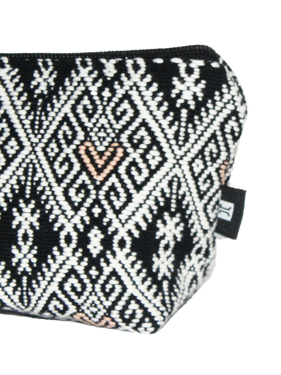 Handwoven and brocade toiletry bag.